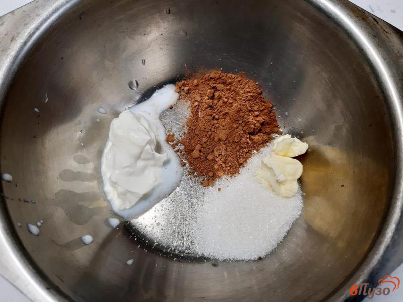 Фото приготовление рецепта: Кексы с изюмом в глазури шаг №11