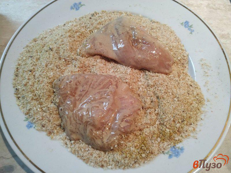 Фото приготовление рецепта: Куриные отбивные с карри шаг №7