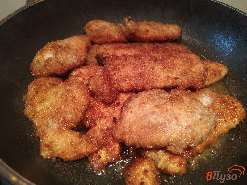 Фото приготовление рецепта: Куриные отбивные с карри шаг №9