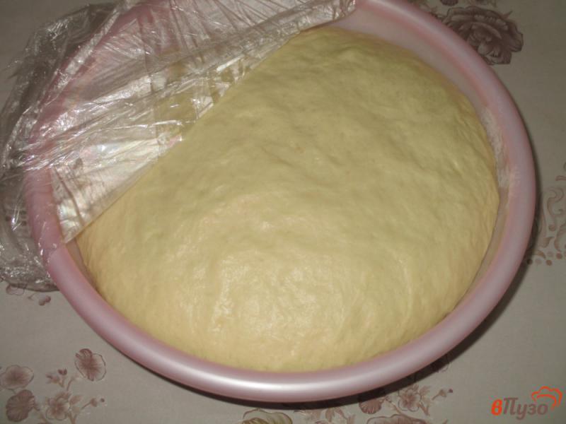 Фото приготовление рецепта: Сладкие пирожки с персиковым джемом шаг №7