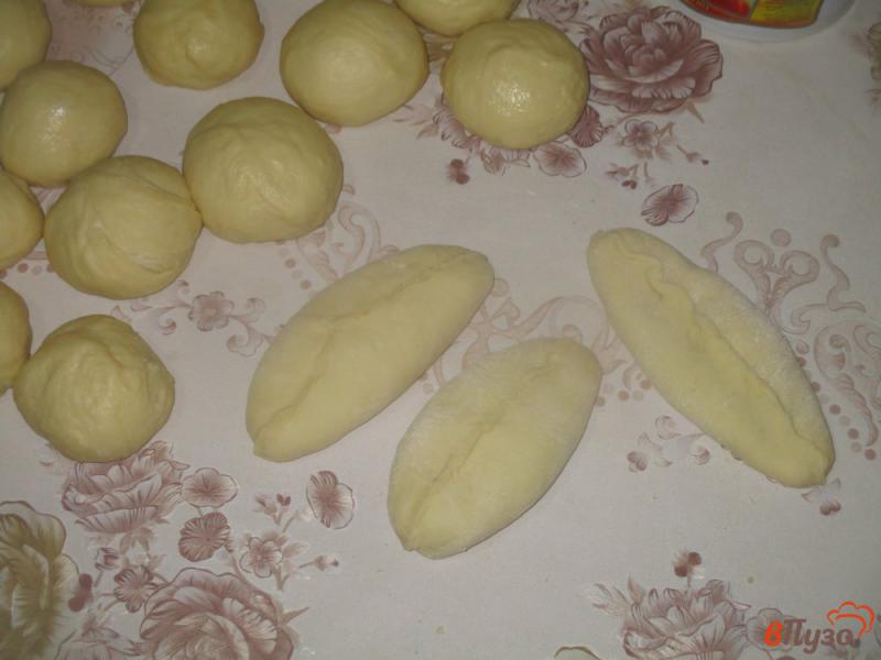 Фото приготовление рецепта: Сладкие пирожки с персиковым джемом шаг №10
