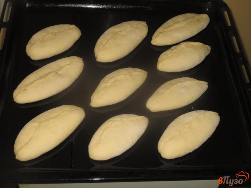 Фото приготовление рецепта: Сладкие пирожки с персиковым джемом шаг №11