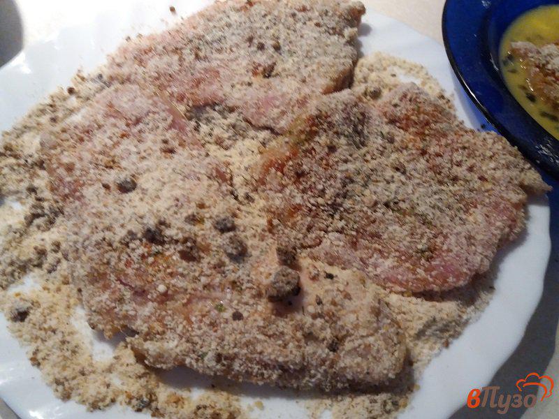 Фото приготовление рецепта: Отбивные из свинины в маринаде из азиатских трав шаг №4