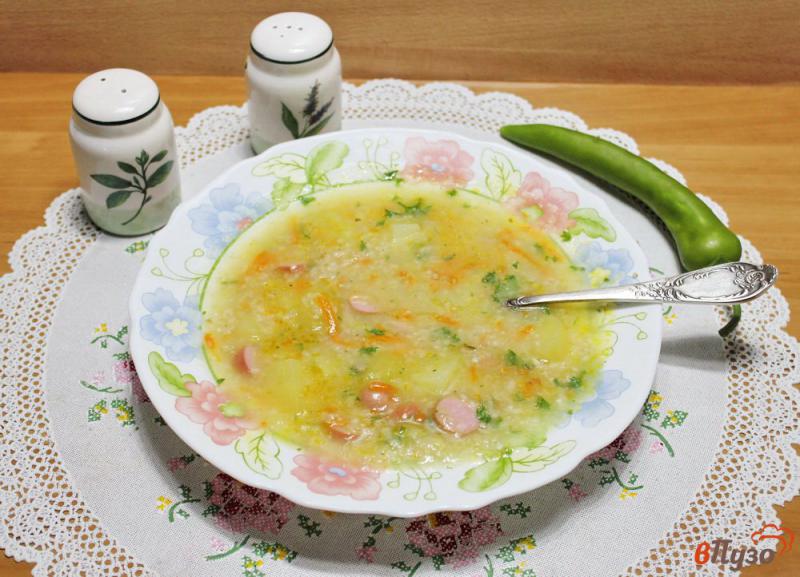 Фото приготовление рецепта: Суп с овсяными хлопьями и сосисками шаг №6