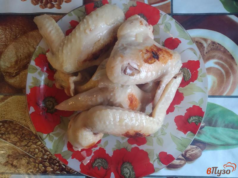 Фото приготовление рецепта: Тушёные куриные крылышки в мультиварке шаг №6