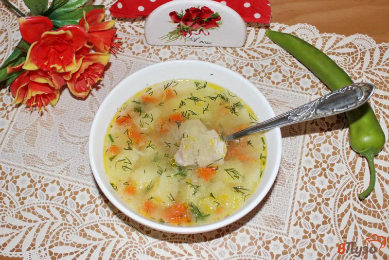 Фото приготовление рецепта: Суп с курицей и рисом шаг №5