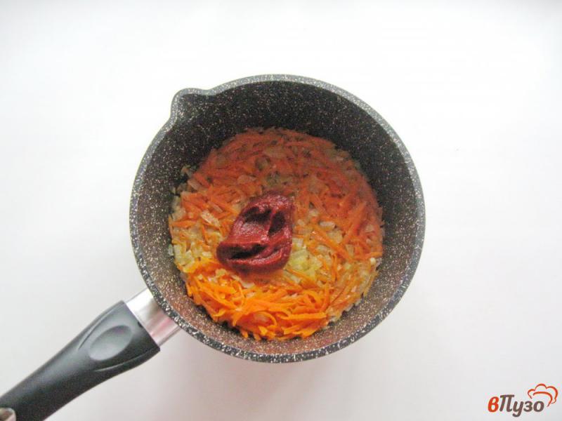 Фото приготовление рецепта: Хек в томатном соусе шаг №3