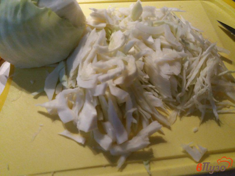 Фото приготовление рецепта: Щи из сежей капусты со свиными ребрышками шаг №2