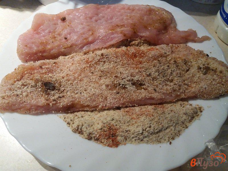 Фото приготовление рецепта: Отбивные из свинины с прованскими травами шаг №4