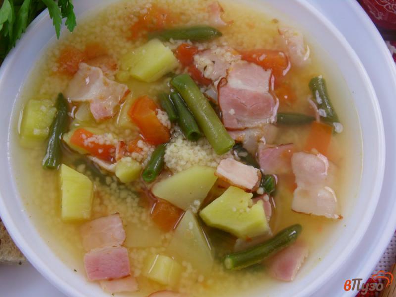 Фото приготовление рецепта: Суп овощной с кускусом и беконом шаг №7