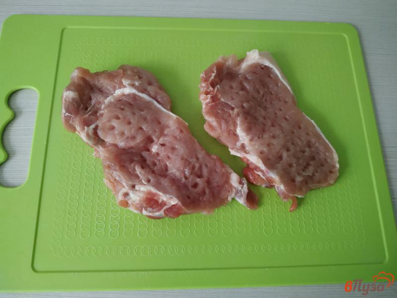 Фото приготовление рецепта: Свиной стейк запечённый в духовке шаг №2