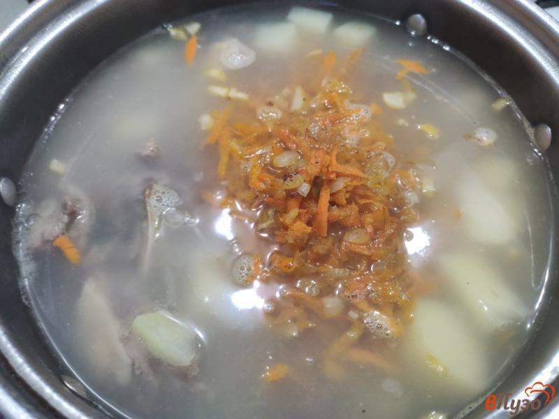 Фото приготовление рецепта: Суп с сырными пельменями шаг №9