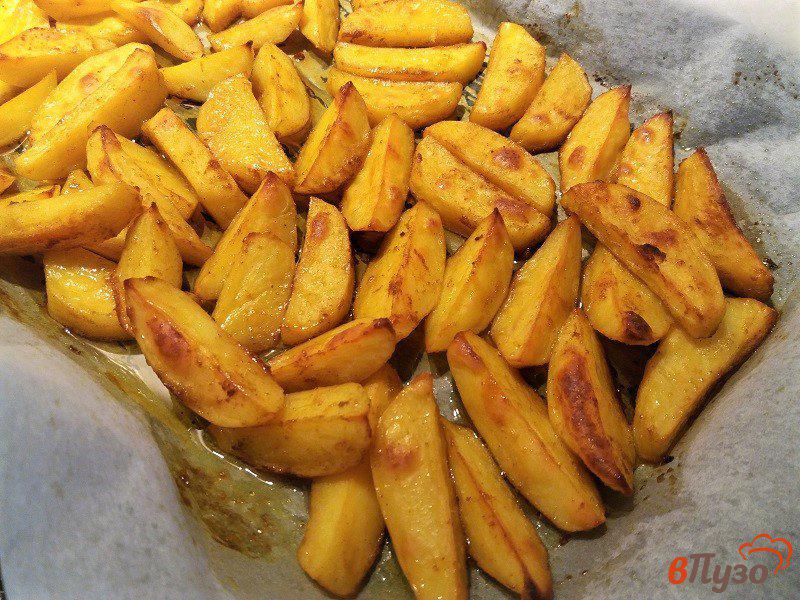 Фото приготовление рецепта: Запеченный картофель фри шаг №7