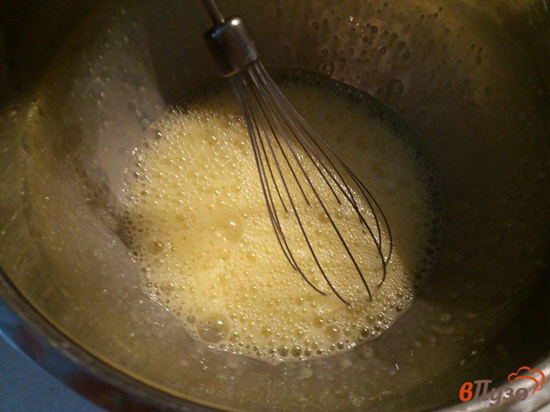 Фото приготовление рецепта: Запеканка из творога тыквы и изюма со вкусом апельсина шаг №3