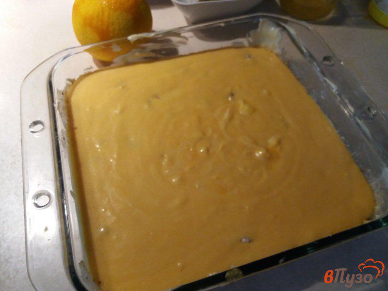 Фото приготовление рецепта: Запеканка из творога тыквы и изюма со вкусом апельсина шаг №6