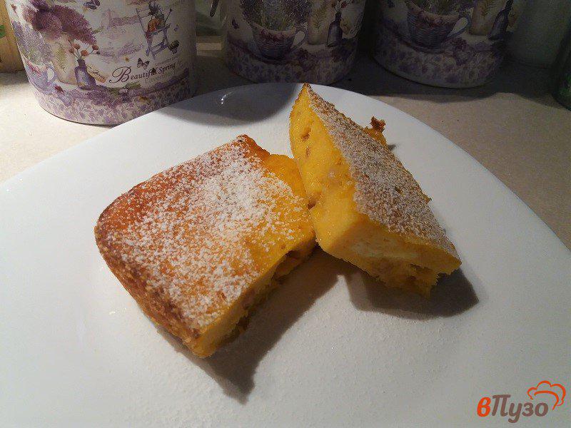 Фото приготовление рецепта: Запеканка из творога тыквы и изюма со вкусом апельсина шаг №8