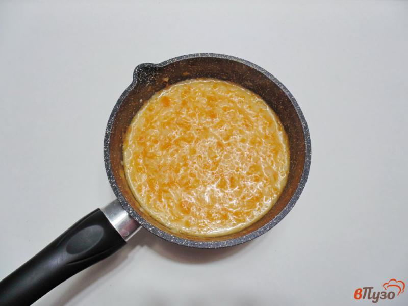 Фото приготовление рецепта: Тыквенная каша с рисом и ванилью шаг №5