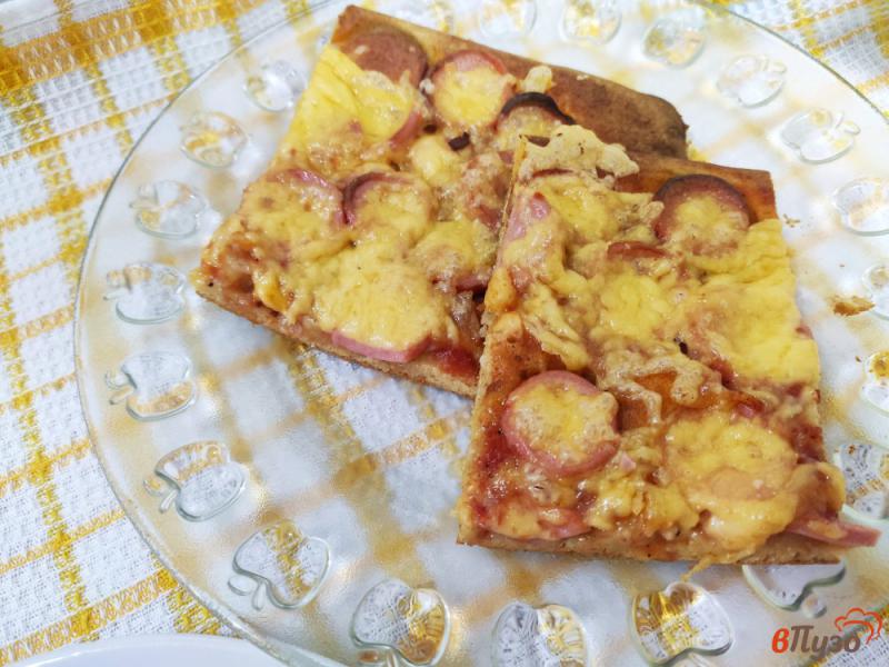 Фото приготовление рецепта: Пицца на тесте из сметаны и желтков шаг №10