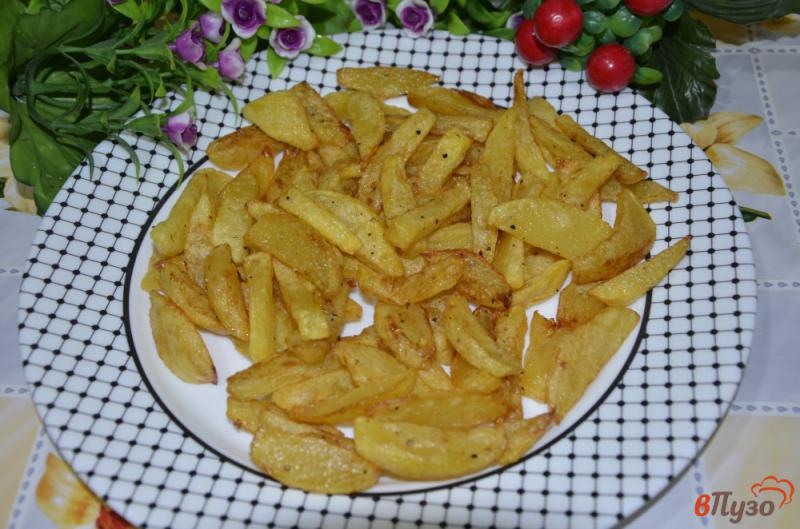 Фото приготовление рецепта: Острый картофель фри шаг №6