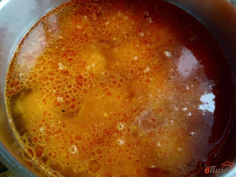 Фото приготовление рецепта: Тефтели в томатном соусе шаг №12