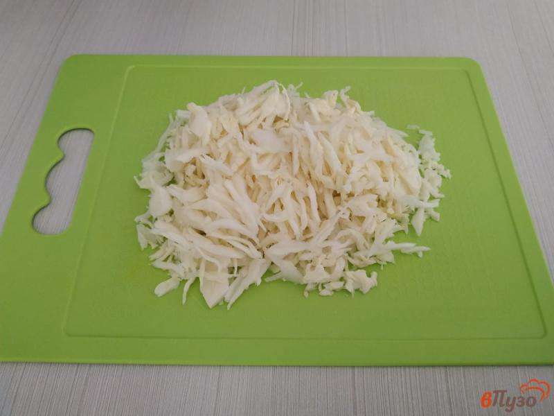 Фото приготовление рецепта: Овощное рагу с сосисками шаг №7