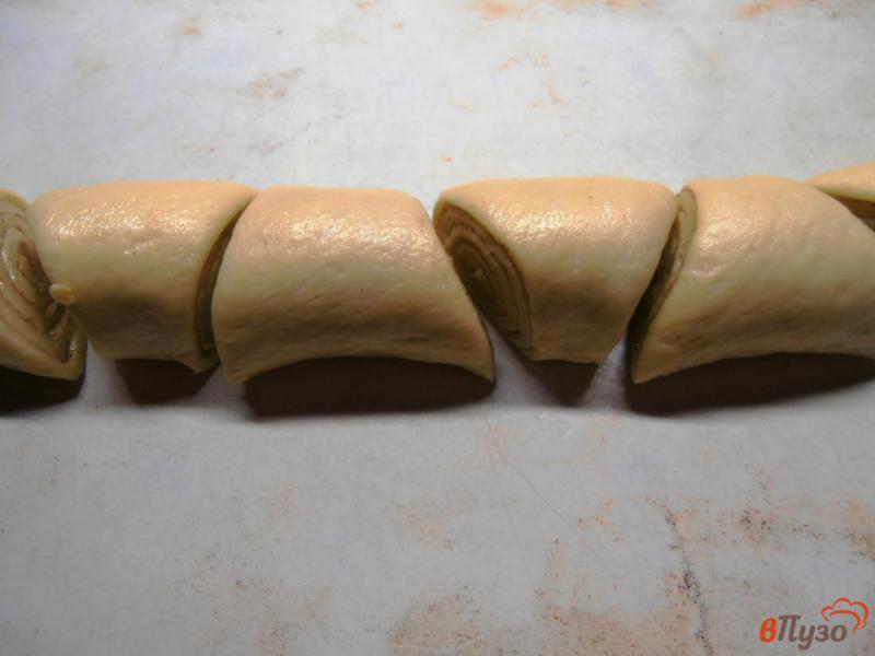 Фото приготовление рецепта: Корвапуусти - булочки с корицей шаг №7