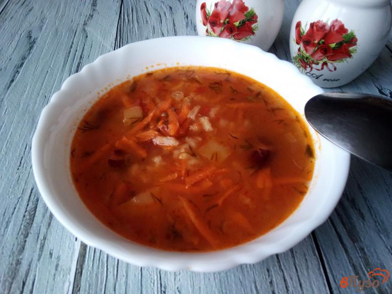Фото приготовление рецепта: Томатный суп с рисом и фасолью шаг №8
