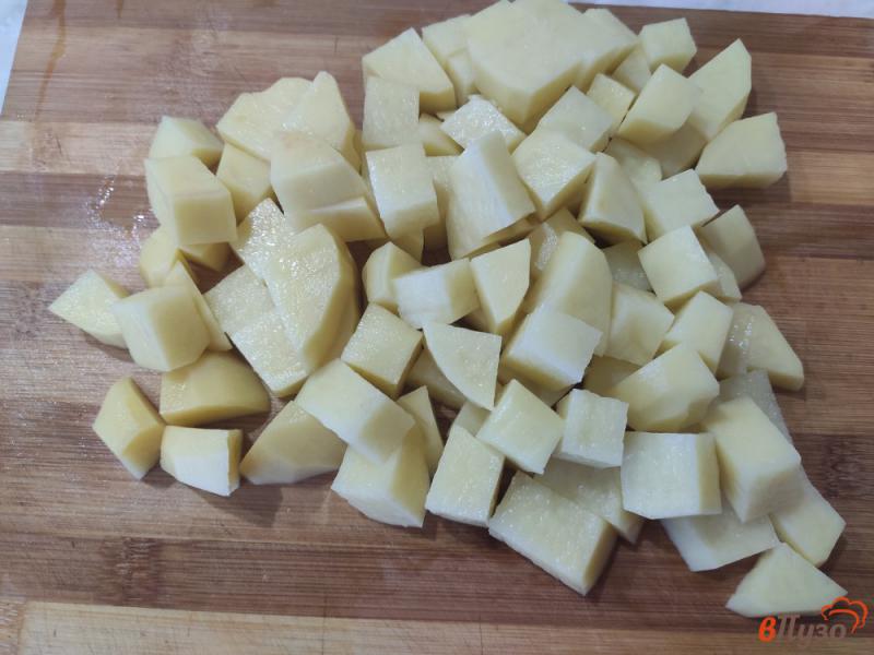 Фото приготовление рецепта: Капустняк со свежей капустой и солёными огурцами шаг №2