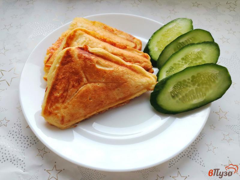 Фото приготовление рецепта: Сэндвичи с ветчиной и сыром в мультипекаре шаг №11