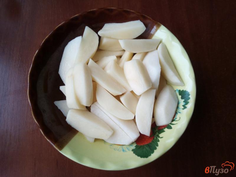 Фото приготовление рецепта: Картофель со свиными ребрами в духовке шаг №3
