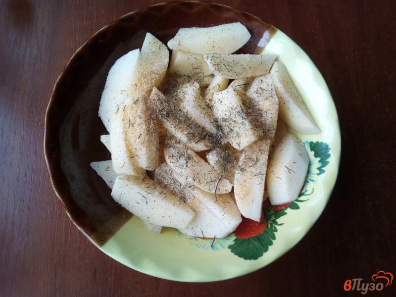 Фото приготовление рецепта: Картофель со свиными ребрами в духовке шаг №4