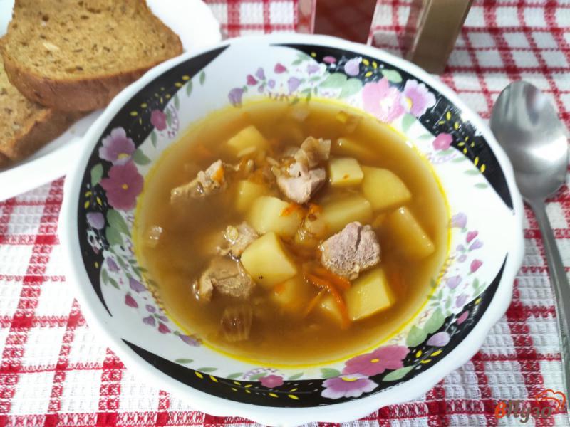 Фото приготовление рецепта: Суп со свининой и рисом шаг №6