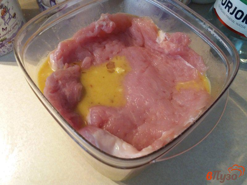 Фото приготовление рецепта: Отбивные из свинины в горчичном маринаде шаг №5