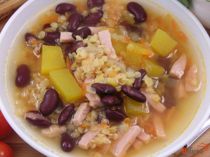 Фото приготовление рецепта: Суп из чечевицы с фасолью и тыквой шаг №7