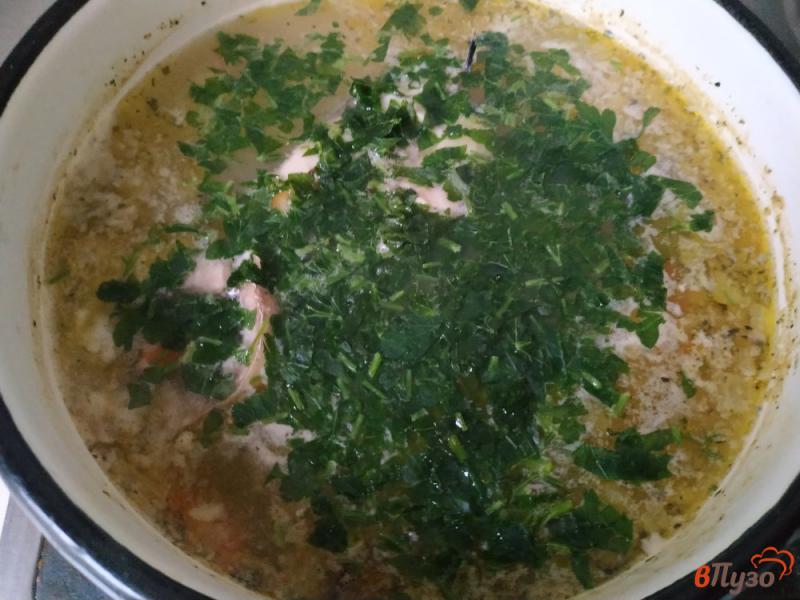 Фото приготовление рецепта: Суп со скумбрией и рисом шаг №9