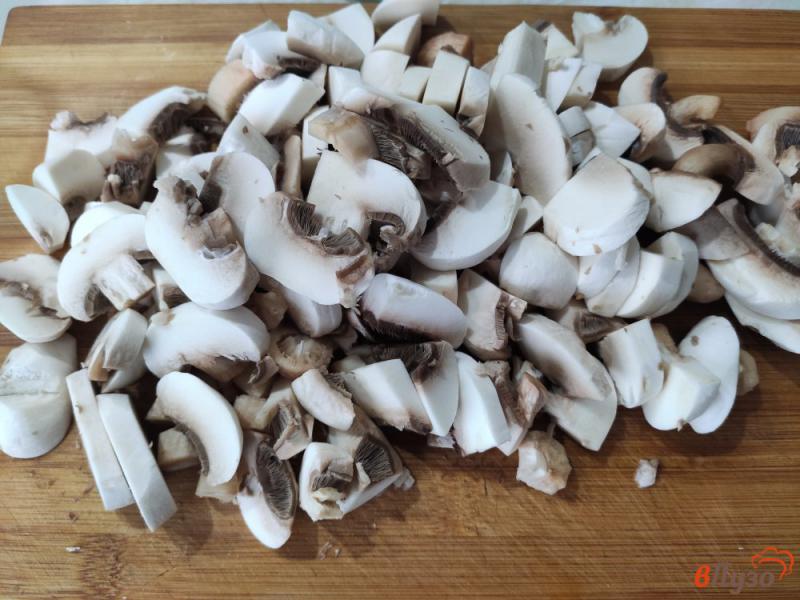 Фото приготовление рецепта: Капустная запеканка с грибами шаг №5