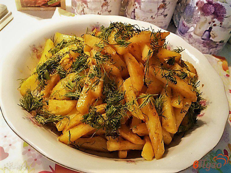 Фото приготовление рецепта: Запеченный картофель фри с паприкой шаг №9
