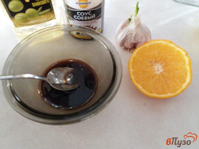 Фото приготовление рецепта: Жаренные лангустины в апельсиновом маринаде с чесноком шаг №3