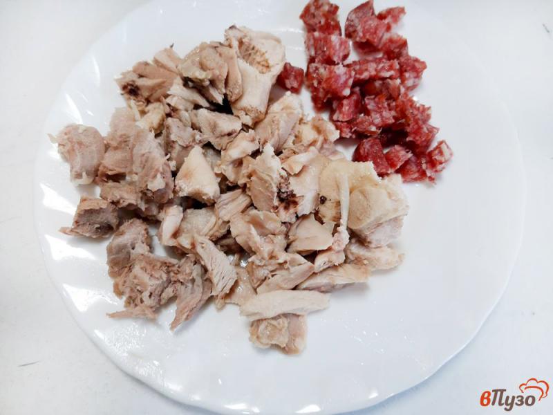 Фото приготовление рецепта: Солянка мясная с оливками и колбасками шаг №9