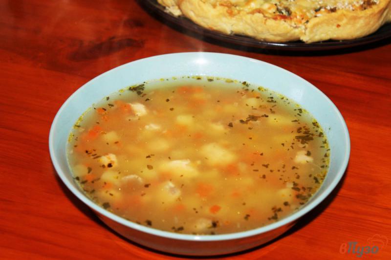 Фото приготовление рецепта: Суп с булгуром и красной рыбой шаг №6
