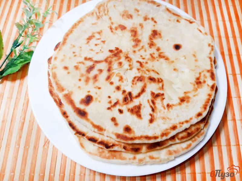 Фото приготовление рецепта: Хачапури с фетой и твердым сыром шаг №15