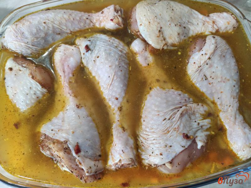 Фото приготовление рецепта: Куриные голени с рисом в духовке шаг №7