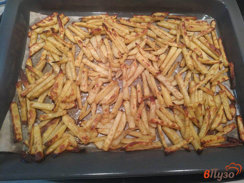 Фото приготовление рецепта: Запеченный картофель с чесноком и зеленью шаг №7