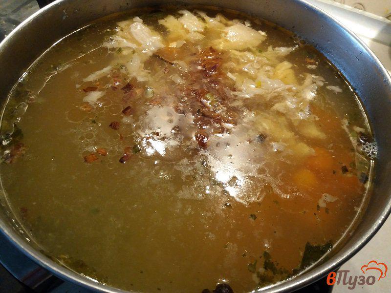 Фото приготовление рецепта: Рыбный суп из сёмги с луком шалот шаг №9