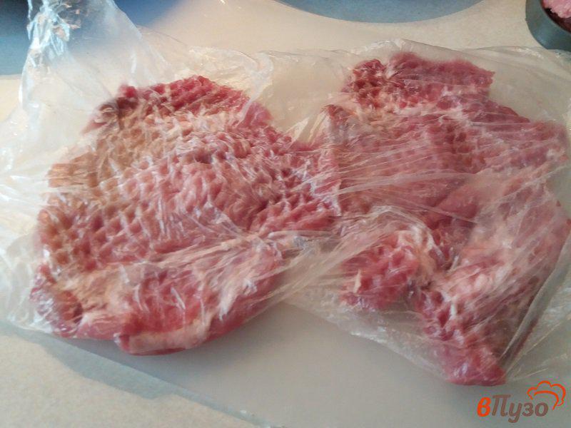 Фото приготовление рецепта: Отбивная из свинины с тушёными овощами шаг №1