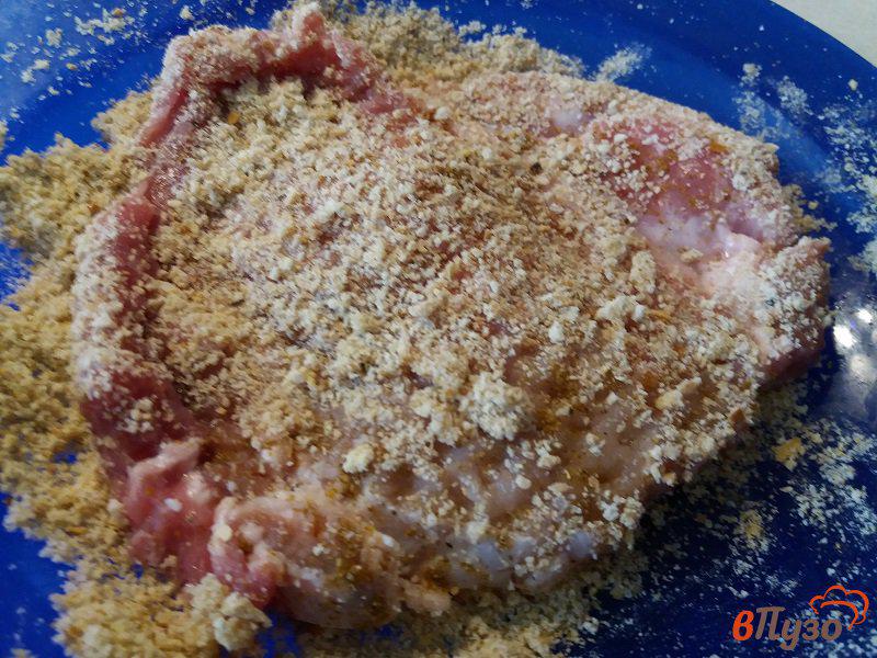 Фото приготовление рецепта: Отбивная из свинины с тушёными овощами шаг №2