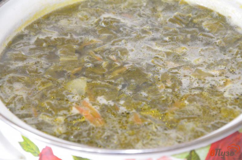 Фото приготовление рецепта: Постный щавелевый суп с красной чечевицей шаг №6