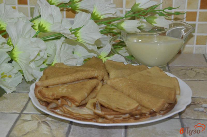 Фото приготовление рецепта: Блины на молоке со сгущенкой шаг №8