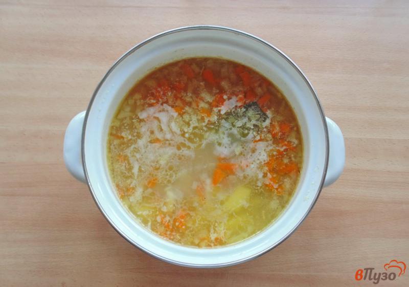 Фото приготовление рецепта: Суп из головы и хребта толстолобика шаг №8