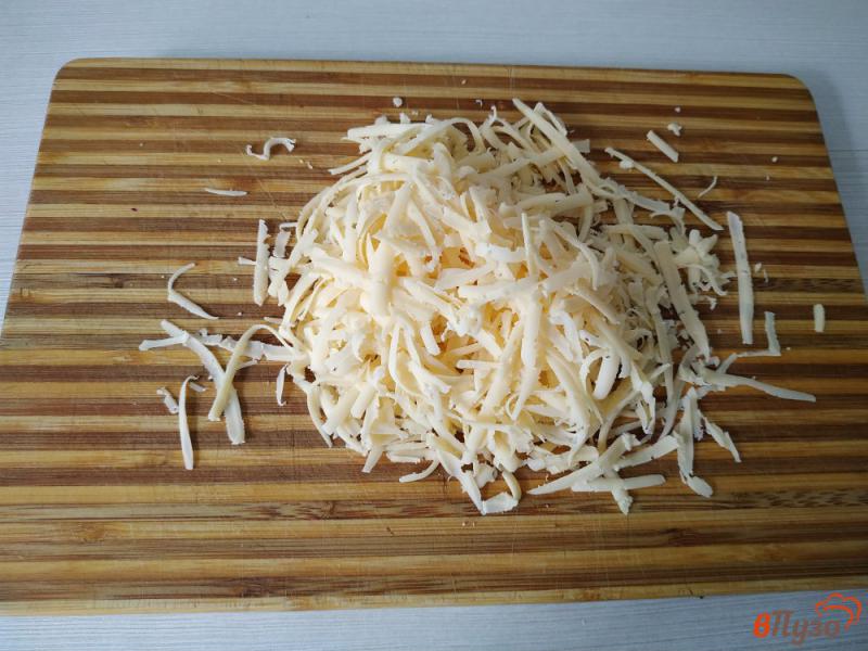 Фото приготовление рецепта: Запеканка из макарон сосисок и яиц шаг №8